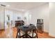 Bonus room featuring a dining set, kitchenette, and hardwood floors at 4835 Merlendale Ct, Atlanta, GA 30327