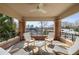 Relaxing covered porch with comfortable seating, offering a serene outdoor space for enjoying the views and fresh air at 4835 Merlendale Ct, Atlanta, GA 30327