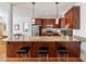 Modern kitchen featuring granite countertops, stainless steel appliances, and a breakfast bar with seating at 4835 Merlendale Ct, Atlanta, GA 30327