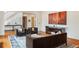 Elegant living room featuring hardwood floors, neutral tones, modern decor, and a view of the staircase at 4835 Merlendale Ct, Atlanta, GA 30327