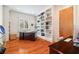 Bright office space with a large window, and custom built in shelving offering functionality and style at 4835 Merlendale Ct, Atlanta, GA 30327