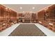 Spacious wine cellar with custom wood racking for ample bottle storage and display at 4835 Merlendale Ct, Atlanta, GA 30327