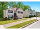 Attractive home with a well-maintained lawn, flower beds, double garage, and inviting front entrance at 1010 Augusta Woods Dr, Douglasville, GA 30134