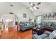 This beautiful living room features hardwood floors, vaulted ceilings, and an open archway at 1010 Augusta Woods Dr, Douglasville, GA 30134