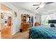 Bright and airy bedroom with trey ceilings and view to ensuite bathroom at 1010 Augusta Woods Dr, Douglasville, GA 30134