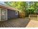Wooden deck with access to the fenced backyard, perfect for relaxing outdoors at 1541 Pontiac Se Pl, Atlanta, GA 30315