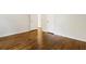 Bedroom features gleaming hardwood floors, fresh paint, and ample natural light at 1541 Pontiac Se Pl, Atlanta, GA 30315