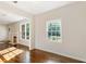 Hardwood floors lead into a living room with bright, natural light at 1541 Pontiac Se Pl, Atlanta, GA 30315