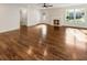 Bright living room boasts hardwood floors, fireplace, and ample natural light at 1541 Pontiac Se Pl, Atlanta, GA 30315