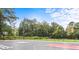 Community blacktop basketball court with chainlink fence and surrounding trees offering recreational opportunities at 2905 Gresham Se Rd, Atlanta, GA 30316