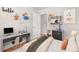 Furnished bedroom with desk, shelves, decorations and a bed at 2905 Gresham Se Rd, Atlanta, GA 30316