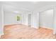 Clean, bright bedroom featuring wood floors and modern closet at 2905 Gresham Se Rd, Atlanta, GA 30316