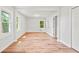 Sun-filled bedroom featuring windows and beautiful wood flooring at 2905 Gresham Se Rd, Atlanta, GA 30316