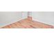 Bedroom with wood floor and white trim and baseboard at 2905 Gresham Se Rd, Atlanta, GA 30316