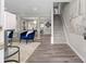 Inviting living space showcasing an open floor plan, stylish decor, and staircase access at 4087 Rosebud Park Dr, Snellville, GA 30039