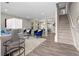 Inviting living space showcasing an open floor plan, stylish decor, and staircase access at 4087 Rosebud Park Dr, Snellville, GA 30039