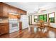 Eat-in kitchen offers lots of cabinet space, tile countertops and beautiful outdoor views at 4316 Acuba Sw Ct, Lilburn, GA 30047