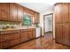 Kitchen boasts wood cabinets, tile countertops and stainless steel appliances at 4316 Acuba Sw Ct, Lilburn, GA 30047