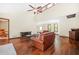 Spacious living room features vaulted ceiling, wood floors, and lots of natural light at 4316 Acuba Sw Ct, Lilburn, GA 30047