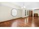 Spacious room with hardwood floors, large window, and natural light at 4316 Acuba Sw Ct, Lilburn, GA 30047
