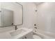 Stylish bathroom featuring a tub with white subway tile and quartz countertop vanity at 1237 Memorial Se Dr # 406, Atlanta, GA 30316