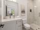 Modern bathroom with a glass-enclosed shower, and vanity with stainless steel fixtures at 1237 Memorial Se Dr # 406, Atlanta, GA 30316