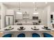 Stylish kitchen with white cabinets, stainless steel appliances, and pendant lighting at 1237 Memorial Se Dr # 406, Atlanta, GA 30316