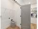Functional laundry area with shelving and modern appliances hookups at 1237 Memorial Se Dr # 406, Atlanta, GA 30316