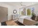 Bedroom with hardwood floors, ample natural light, and neutral tones at 1237 Memorial Se Dr # 406, Atlanta, GA 30316