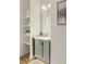 Stylish powder room with a gray vanity and open shelving at 1237 Memorial Se Dr # 406, Atlanta, GA 30316