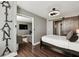 Well-appointed bedroom featuring a comfortable bed and a sliding barn door at 215 Piedmont # 1804, Atlanta, GA 30308