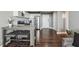 Open-concept kitchen featuring stainless steel appliances and a breakfast bar with seating at 215 Piedmont # 1804, Atlanta, GA 30308