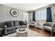 Cozy living room features hardwood floors, neutral colors, and comfortable seating, creating an inviting space at 215 Piedmont # 1804, Atlanta, GA 30308
