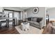 Inviting living area with a comfortable sofa, an open-concept kitchen, and stylish decor at 215 Piedmont # 1804, Atlanta, GA 30308