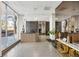 Lobby featuring modern furniture, large windows, stone flooring, and tasteful accents at 215 Piedmont # 1804, Atlanta, GA 30308