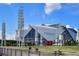 View of Mercedes-Benz Stadium with modern architecture and surrounding landscaping on a partly cloudy day at 215 Piedmont # 1804, Atlanta, GA 30308