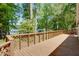Expansive deck with seating and lake view, perfect for entertaining or relaxing outdoors at 2240 E Lake Ne Dr, Conyers, GA 30012