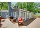 Spacious deck with comfortable seating, perfect for enjoying the outdoor scenery and relaxation at 2240 E Lake Ne Dr, Conyers, GA 30012