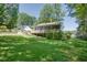 Charming home with a large yard and deck, offering a perfect blend of indoor-outdoor living at 2240 E Lake Ne Dr, Conyers, GA 30012