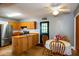 The kitchen features wood cabinets, butcher block countertops, and stainless steel appliances, with table and chairs at 2240 E Lake Ne Dr, Conyers, GA 30012