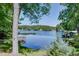 Scenic lake view with a private dock, showcasing the serene waterfront lifestyle at 2240 E Lake Ne Dr, Conyers, GA 30012