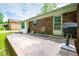 Brick exterior featuring an outdoor patio and a barbeque grill at 3047 E Anderson E Dr, Lithia Springs, GA 30122