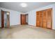 Bedroom with carpet, en suite bathroom, and closet at 3047 E Anderson E Dr, Lithia Springs, GA 30122