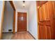 Inviting entryway featuring wood flooring and a solid wood front door at 3047 E Anderson E Dr, Lithia Springs, GA 30122