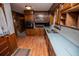 Eat-in kitchen featuring classic wood cabinetry, and an eat-in nook at 3047 E Anderson E Dr, Lithia Springs, GA 30122