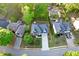 Aerial view of a home with a long driveway and well-maintained landscaping at 3145 Maple Terrace Drive, Suwanee, GA 30024