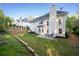 Backyard featuring a patio area and plenty of green space at 3145 Maple Terrace Drive, Suwanee, GA 30024