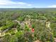 Aerial view showcasing the property's location within a neighborhood, highlighting surrounding greenery and road access at 3917 Plantation Dr, Marietta, GA 30062