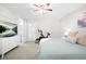 Bright bedroom with a ceiling fan and plenty of room at 3917 Plantation Dr, Marietta, GA 30062