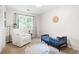bedroom with an alphabet rug, chair, and colorful toddler bed at 3917 Plantation Dr, Marietta, GA 30062